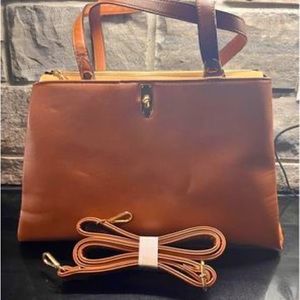 Medium sized purse brand is Crystale